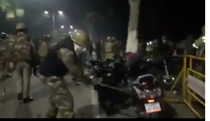 Police damaging motorbike in Aligarh