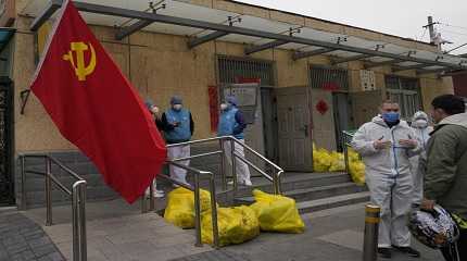 Community workers outside a locked down