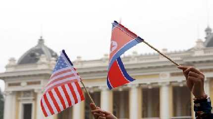 US and North Korean flags