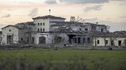 house damaged by an Iranian ballistic missile attack