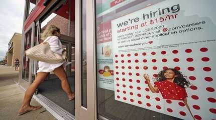 Hiring sign on the door of US store