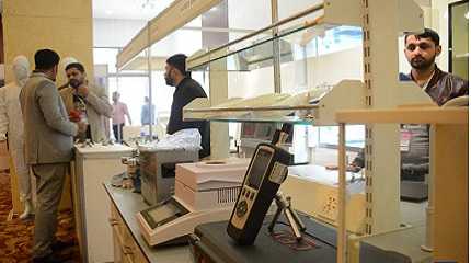 People visit a stall at Pak Pharma and Healthcare Expo