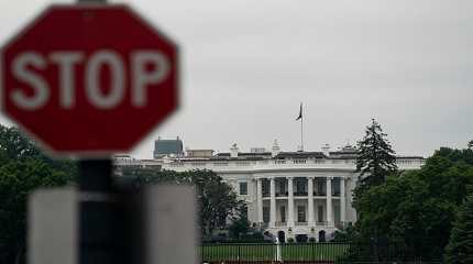 White House and a stop sign in Washington