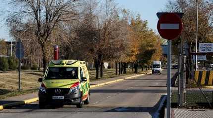 ambulance is seen coming out of the Air Force base