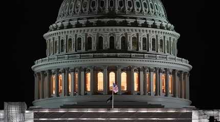 American flags flies on the U.S. Capitol