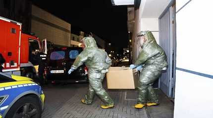 Men in protective suits 