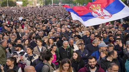 People march during a protest against violence in Belgrade