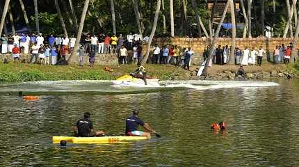 Rescuers on a boat search after a tourist boat capsized