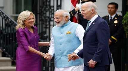 Jill Biden and Joe Biden greet  Narendra Modi