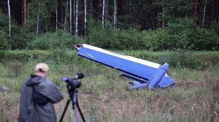 wreckage of the jet linked to Prigozhin near the crash site