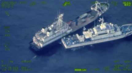 Chinese militia vessel and Philippine coast guard vessel