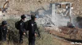 Israeli demolishing Palestinian house