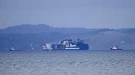 Smoke rises from the Italy-flagged Euroferry Olympia