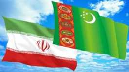 Iran, Turkmenistan flags