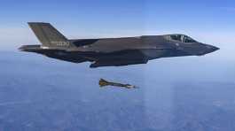 F-35 fighter jet fires a GBU-12 aerial laser