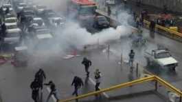 Iran protesters block road