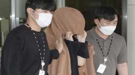 woman leaves to the Seoul Central District Prosecutors' Office