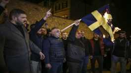 fire a Sweden flag during a protest