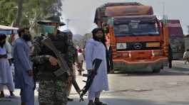 Pakistani soldier and Taliban fighters
