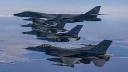 U.S. Air Force B-1B bomber with F-16 fighter jets
