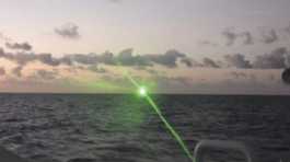 green military-grade laser light from a Chinese coast guard ship