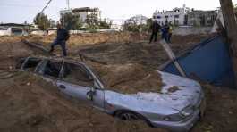 Palestinians inspect damage Israeli airstrikes 