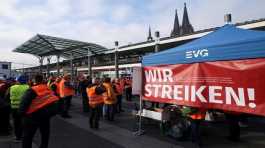 Railway workers protest in front of the Cologne Central Station