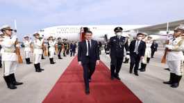 Emmanuel Macron arrives at Beijing