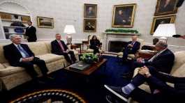 Joe Biden is flanked by Kamala Harris and Senate Leader