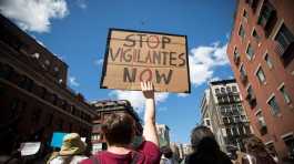 People take part in a protest