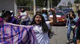 Roxana Ruiz shouts slogans during a march