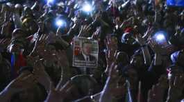 Supporters of Tayyip Erdogan cheer at the party headquarters