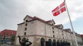 Danish flag flies in front of the foreign ministry in Copenhagen