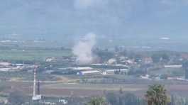 Smoke rises above Kfar Yuval